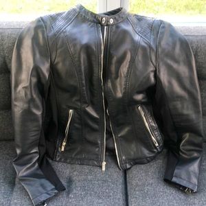 Black Express faux leather zippered jacket with zip pockets.